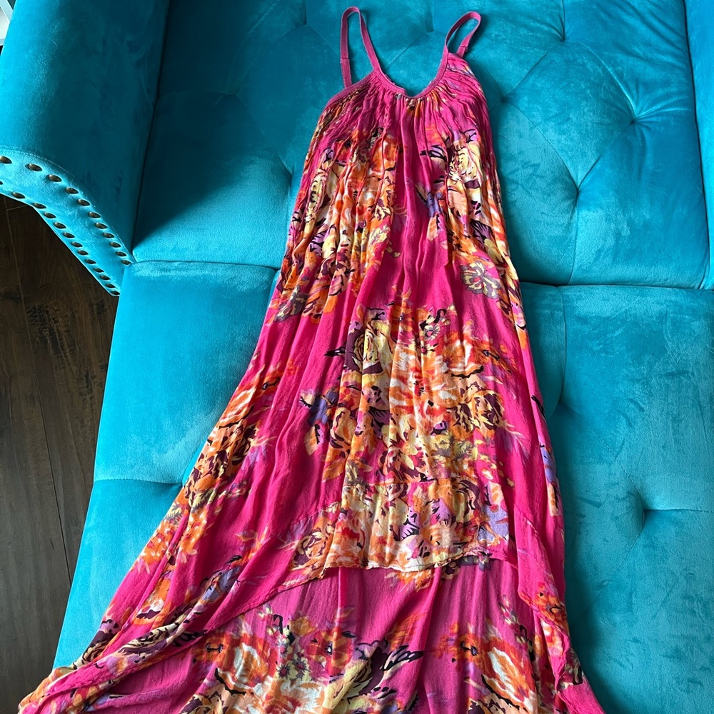 Vibrant pink high-low dress with large flowers